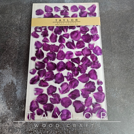 Handmade Elm charcuterie board with natural Elm on one side and real red rose petals encased in clear resin on the other, designed for serving, chopping or decorative display.