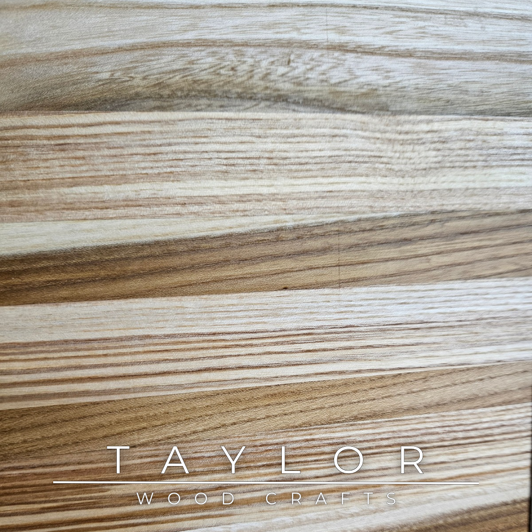 Handmade Elm charcuterie board with natural Elm on one side and real red rose petals encased in clear resin on the other, designed for serving, chopping or decorative display.