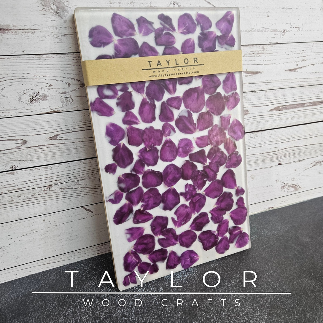Handmade Elm charcuterie board with natural Elm on one side and real red rose petals encased in clear resin on the other, designed for serving, chopping or decorative display.