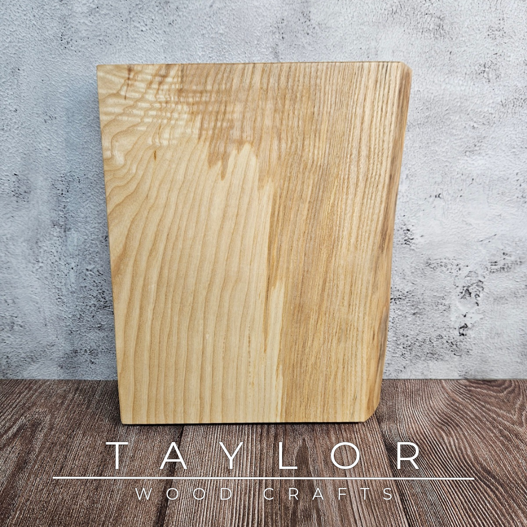 Handmade live edge hardwood cutting block crafted in Northern Ireland by Taylor Wood Crafts.