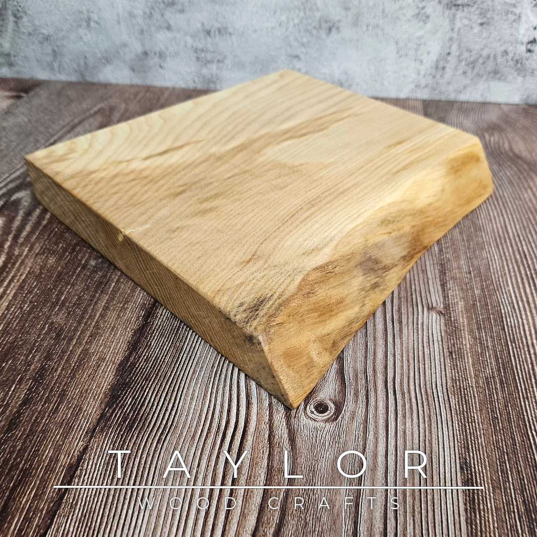 Handmade live edge hardwood cutting block crafted in Northern Ireland by Taylor Wood Crafts.