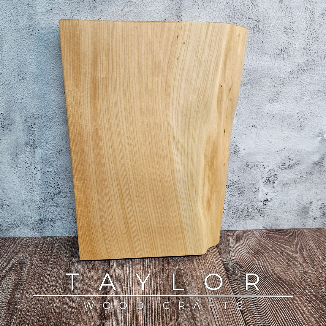 Handmade live edge hardwood cutting block crafted in Northern Ireland by Taylor Wood Crafts.