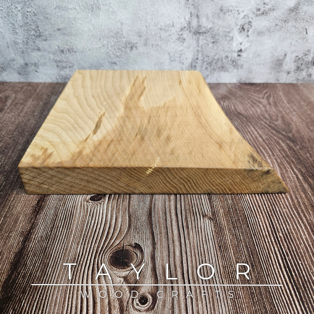 Handmade live edge hardwood cutting block crafted in Northern Ireland by Taylor Wood Crafts.