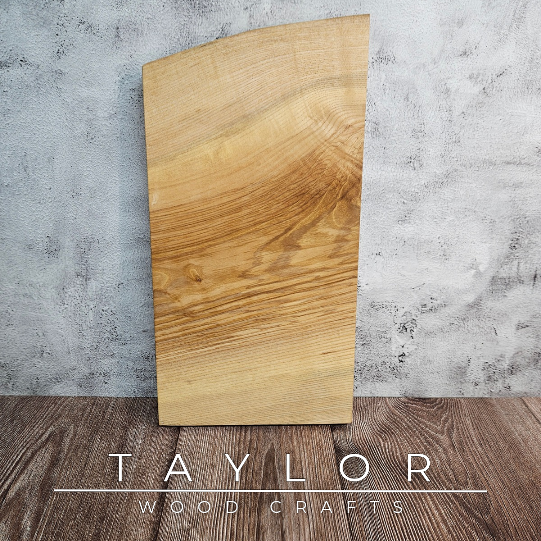 Handmade live edge hardwood cutting block crafted in Northern Ireland by Taylor Wood Crafts.