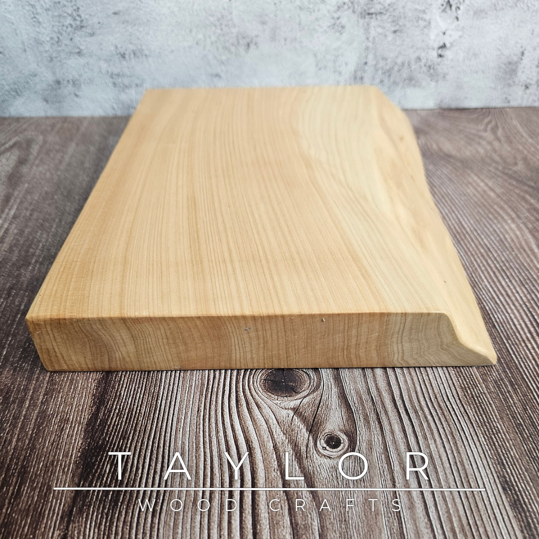 Handmade live edge hardwood cutting block crafted in Northern Ireland by Taylor Wood Crafts.