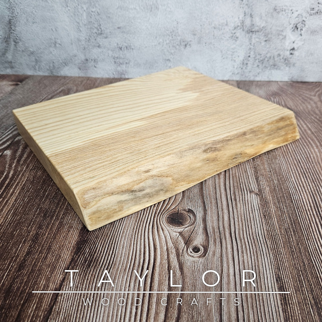 Handmade live edge hardwood cutting block crafted in Northern Ireland by Taylor Wood Crafts.