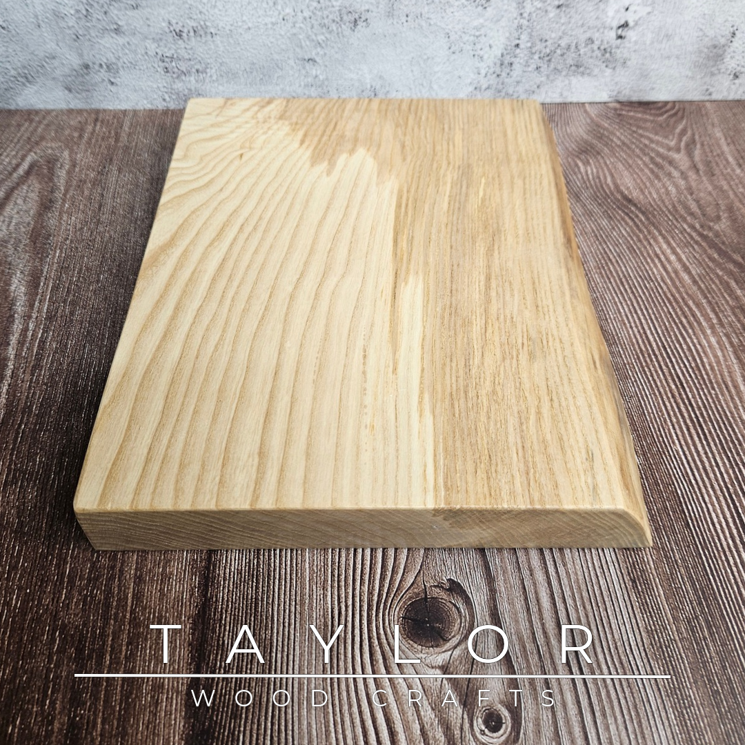 Handmade live edge hardwood cutting block crafted in Northern Ireland by Taylor Wood Crafts.