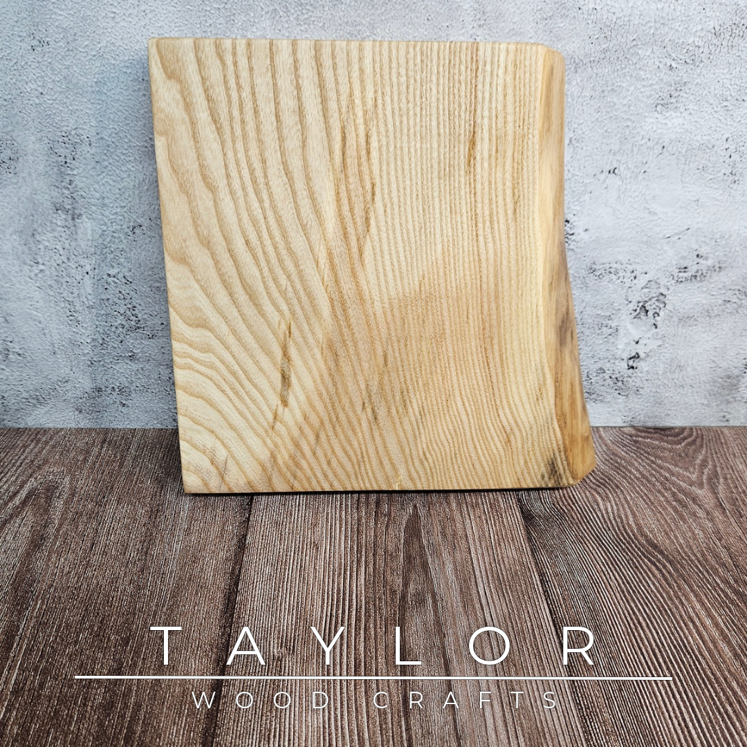 Handmade live edge hardwood cutting block crafted in Northern Ireland by Taylor Wood Crafts.