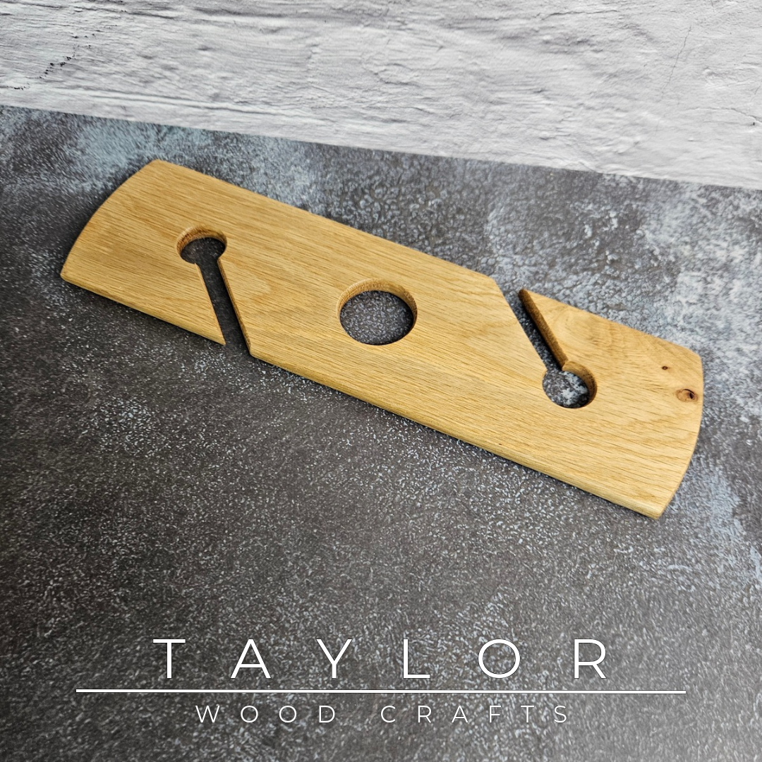 Handmade solid oak wine caddy with optional personalised laser engraving, crafted in Northern Ireland by Taylor Wood Crafts.