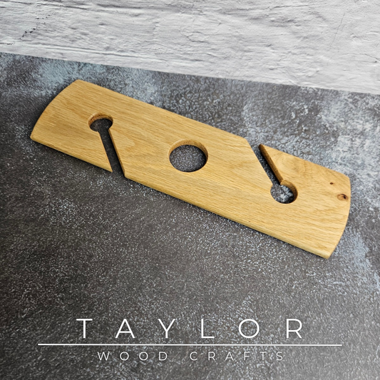 Handmade solid oak wine caddy with optional personalised laser engraving, crafted in Northern Ireland by Taylor Wood Crafts.