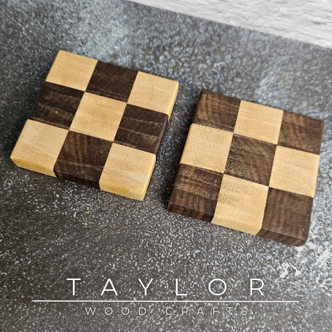 Handmade set of 2 checkerboard coasters crafted from American Black Walnut and Canadian Maple, made in Northern Ireland by Taylor Wood Crafts.