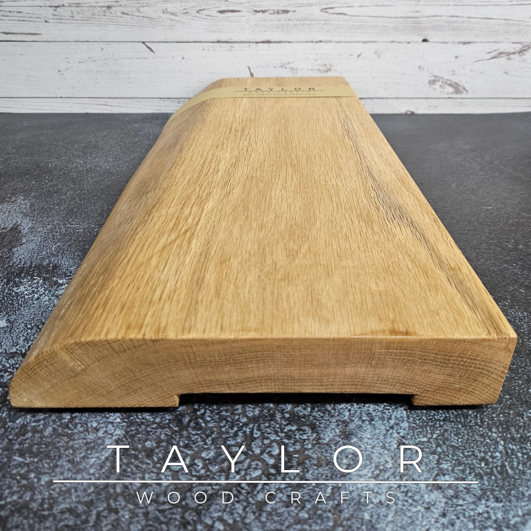 Handmade live edge Oak chopping block with natural timber grain and character, designed as a beautiful and practical addition to the family kitchen.