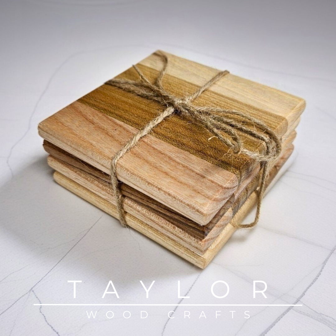 Stack of wooden coasters tied with twine on a white surface, with 'Taylor Wood Crafts' branding.