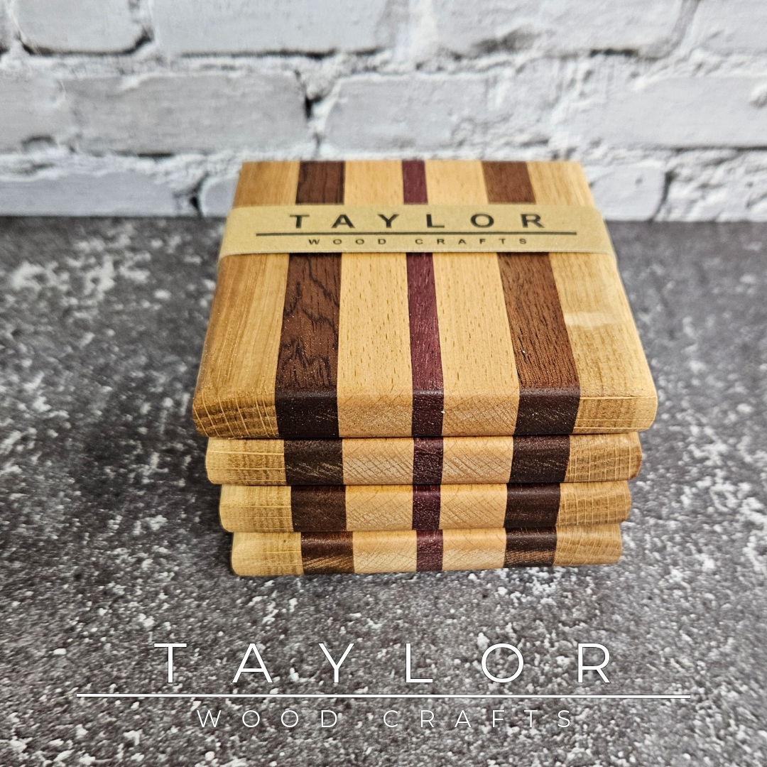 One-of-a-kind handmade wooden coaster set featuring a unique striped pattern created from contrasting hardwoods.
