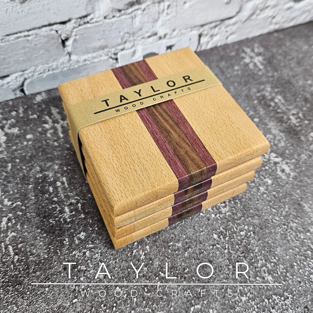 One-of-a-kind handmade wooden coaster set featuring a unique striped pattern created from contrasting hardwoods.